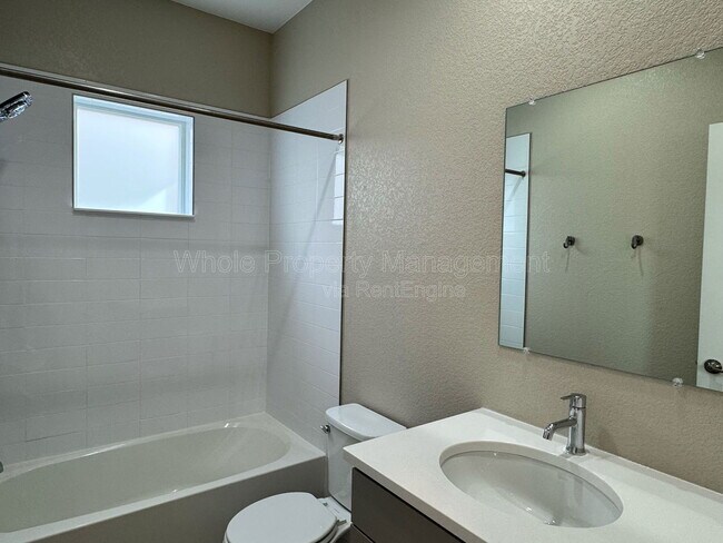 Building Photo - 1451 W 67th Ave