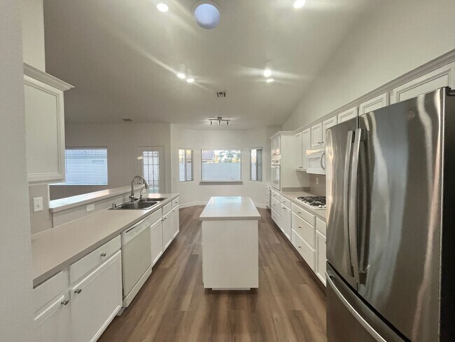 Building Photo - 2470 sq ft, remodeled single story, hard to find 5 bed, 2.5 bath, 2 car garage in guard gated Sta...