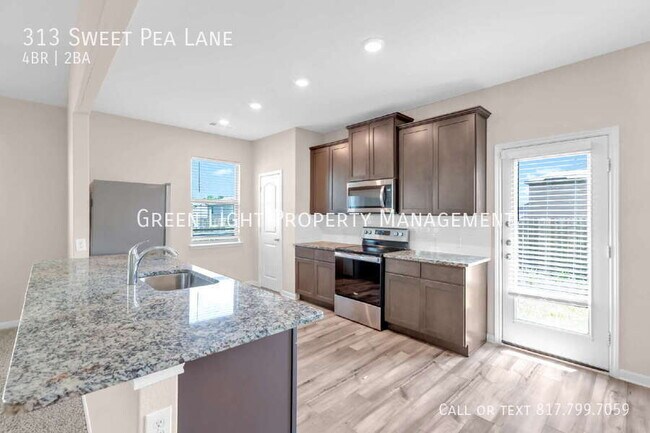 Building Photo - 313 Sweet Pea Ln