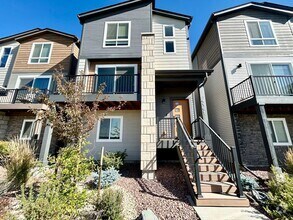 Building Photo - Impressive 4 Bedroom Townhome Nestled in M...