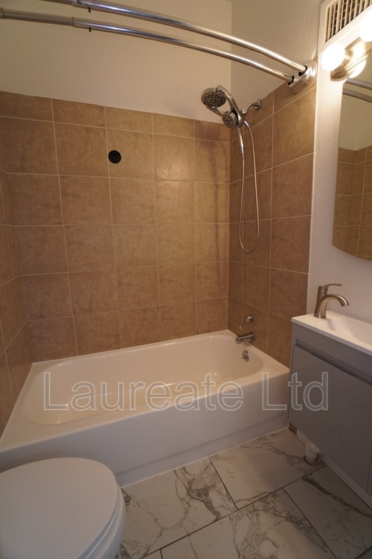 Building Photo - 2417 E 47th Ave