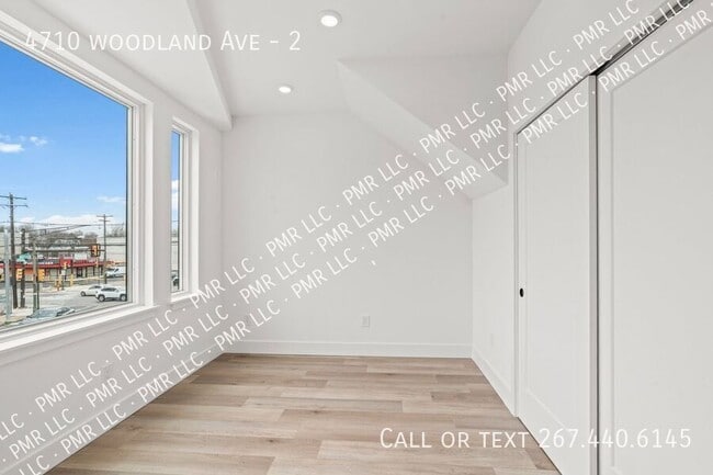 Building Photo - 4710 Woodland Ave