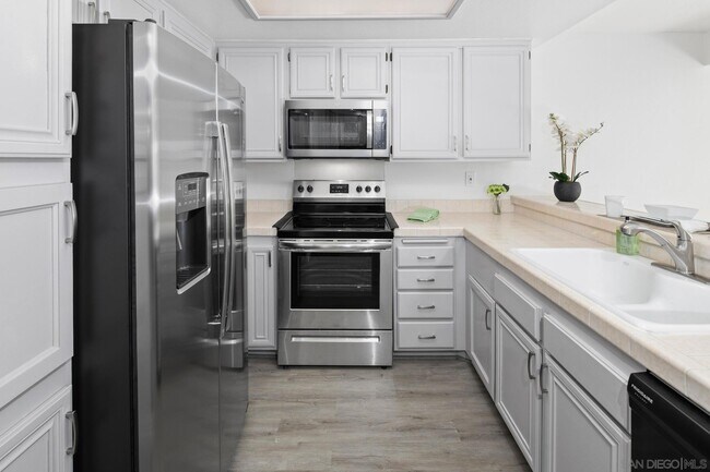 Building Photo - 6877 Caminito Mundo