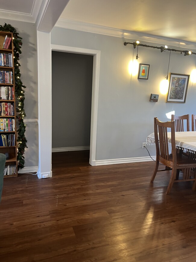 Hallway accesses two bedrooms and a full bathroom - 14131 Chandler Blvd