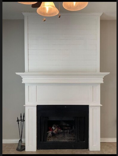 shiplap fireplace with mantle - 5131 Butter Creek Ln
