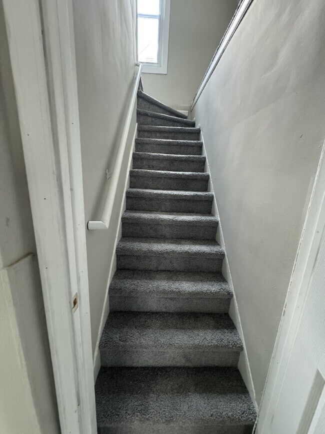 Building Photo - The Perfect Balance of Space and Simplicity