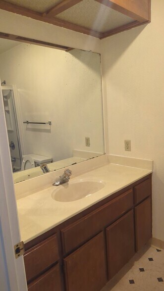 Bedroom 1 suite vanity - 606 San Conrado Ter