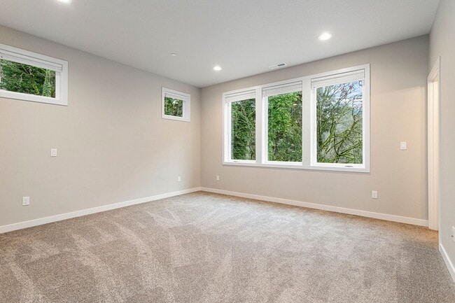 Building Photo - 2022 Build -Almost Brand New 3 br 2.5 bth Home with hardwoods, fenced yard and backs to greenspace !