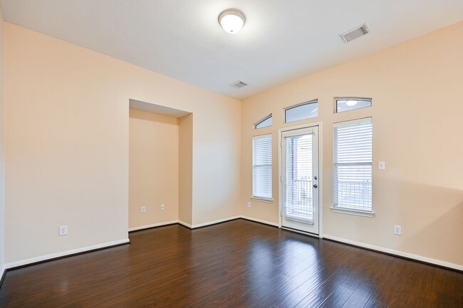 Building Photo - Gorgeous and spacious three-story townhome!