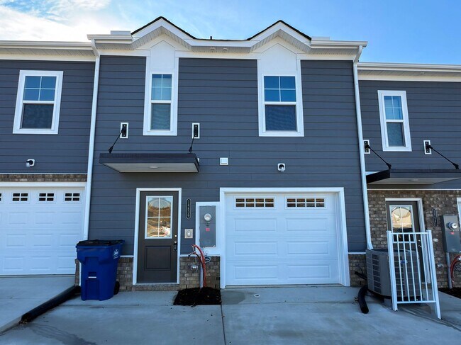 Building Photo - Modern New 3BR Townhome in Hancock Village with Luxury Finishes