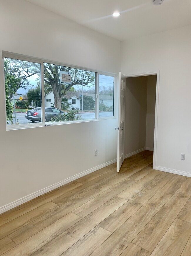 Bedroom with walk-in closet - 7465 Garden Grove Ave