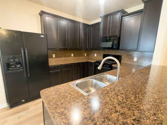 Building Photo - 17035 Amarose Dr