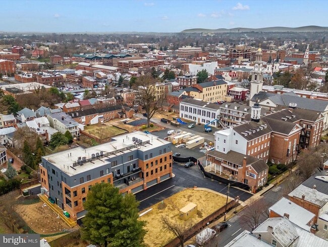 Building Photo - 210 E 2nd St