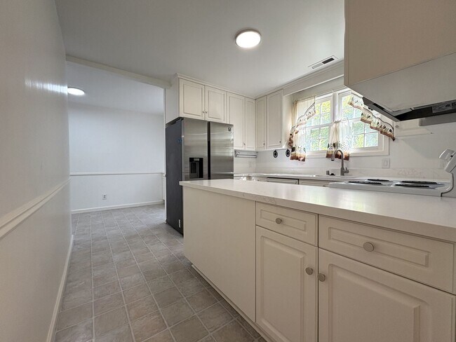 Building Photo - Charming Updated 4BR Home on Prime Corner ...