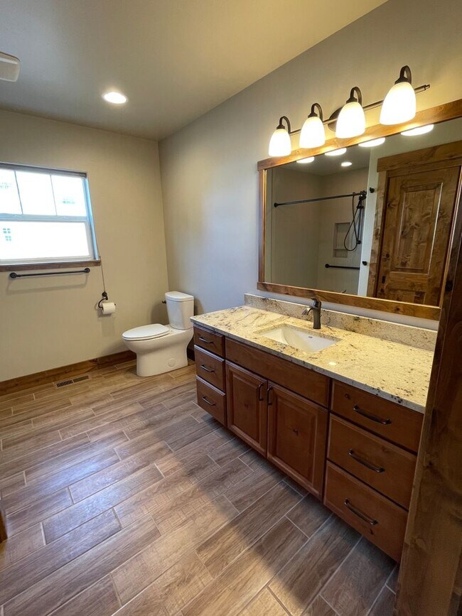 Building Photo - High-end home with 3 car garage and panoramic views of Big Mountain!