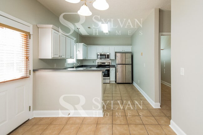 Building Photo - Turn the key. Enter. Smile. Repeat every day!