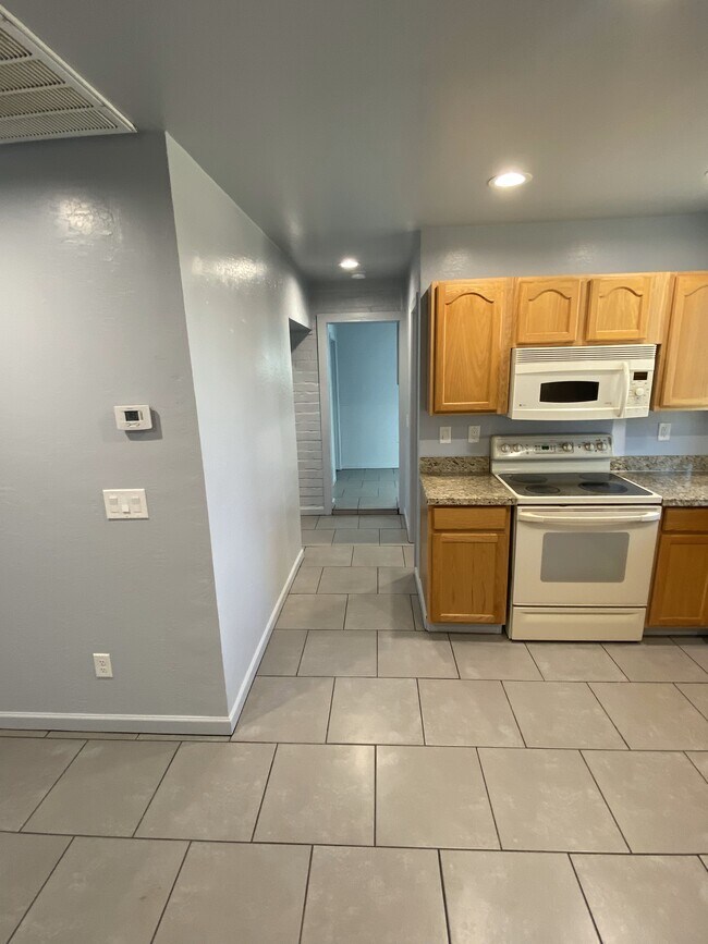 Hallway to kitchen - 215 N Pima Rd