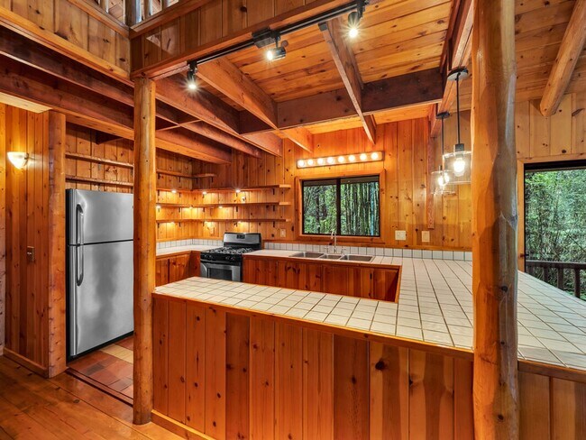 Building Photo - 3 bedrooms 2 bathroom with a large Loft for generational living + storage shed