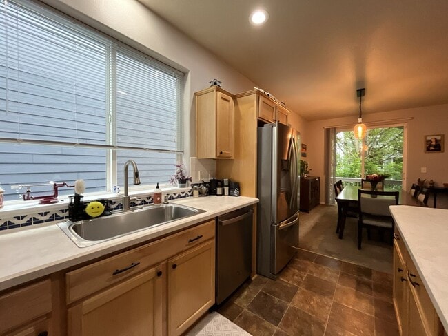 Building Photo - Modern 2 Bedroom + Bonus Room Townhome Near Nike with Dual En Suites, Balcony & Attached Garage
