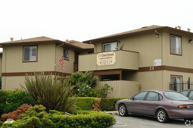 Building Photo - The Courtyard Apartments
