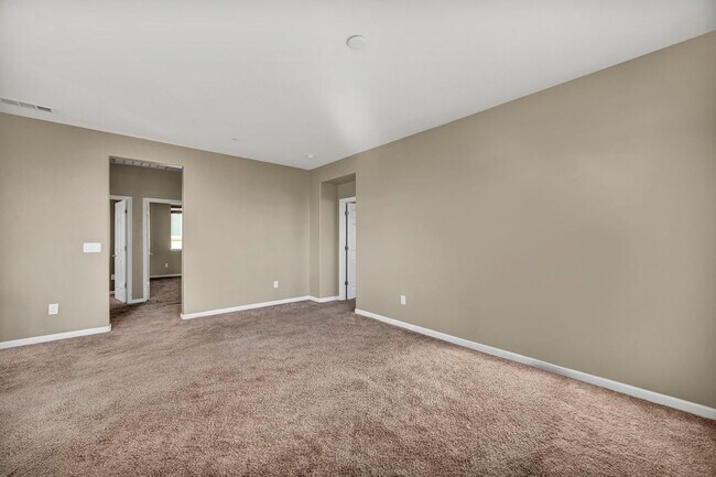 Building Photo - Sun-Filled, Spacious Living with a Three-Car Garage