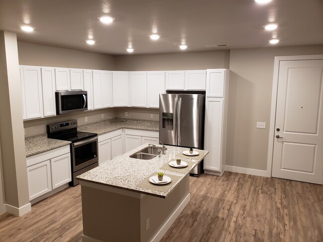 Spacious kitchen with new appliances - 14341 E Tennessee Ave