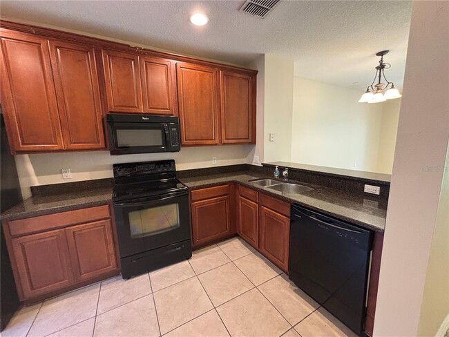 Building Photo - 8515 Trail Wind Dr