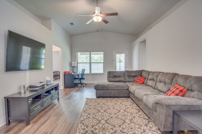 Building Photo - Spacious 4BR/2BA Brick Home with 2-Car Garage, Granite Kitchen, Vaulted Ceilings & Fully Fenced B...