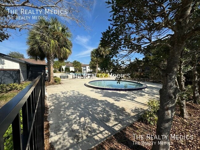 Building Photo - Available NOW! Charming 2-Bedroom Condo in...