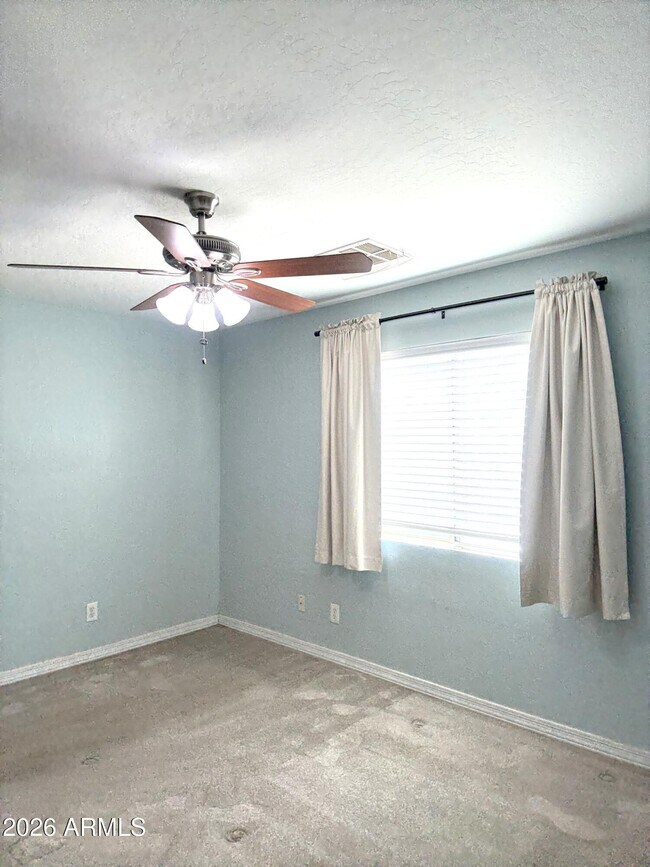 Building Photo - 14869 W Caribbean Ln