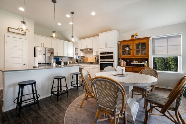 Building Photo - 4 Bedroom Home with Stone Patio, Built-In Gazebo & Amenity-Rich Community Living