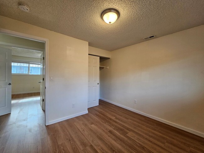 Building Photo - Charming Single-Level Home Featuring New Hardwood Floors, Bright Bedrooms & Open-Concept Living