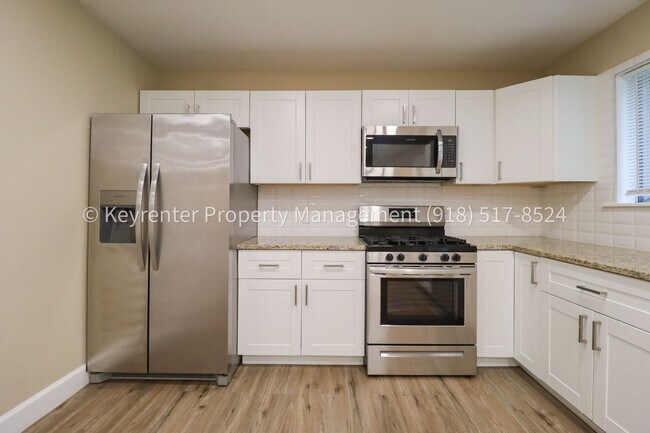 Building Photo - 11621 N 103rd E Ave