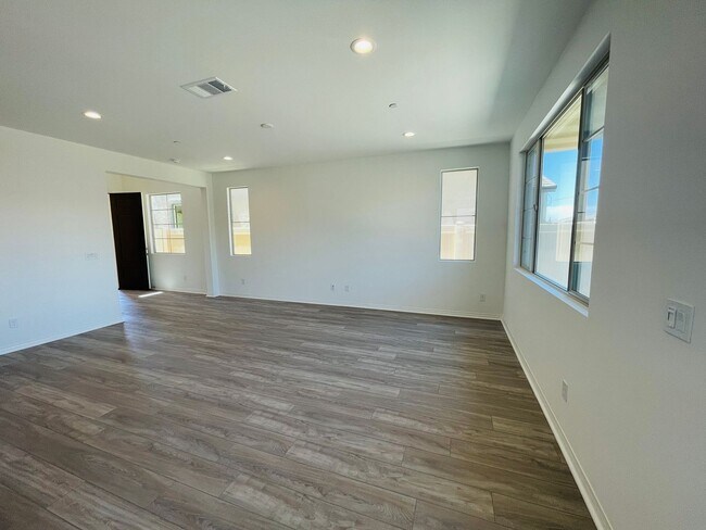Building Photo - Located in the highly sought-after master-planned community of The Preserve at Chino, this modern...