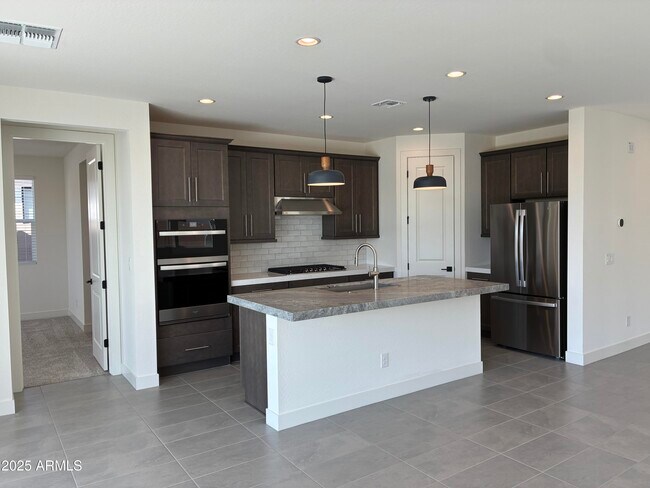 Building Photo - 10862 N Brownsville Ln