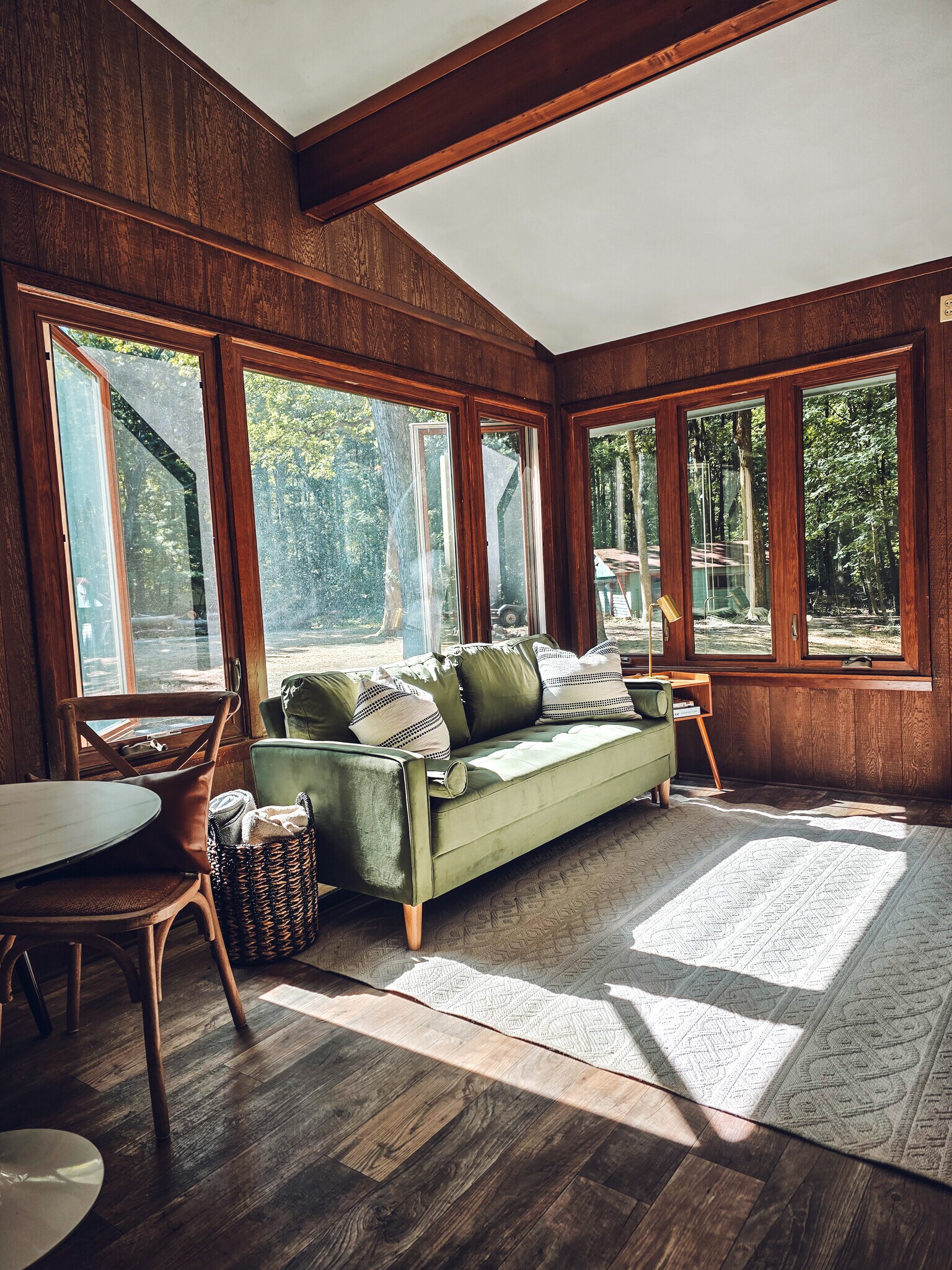 Living room with large windows and fireplace - 1008 W Singing Woods Rd