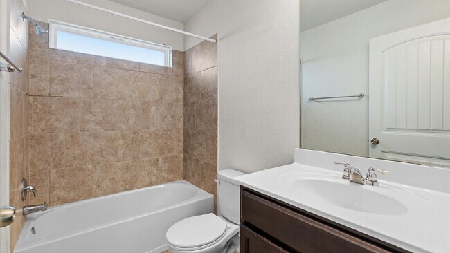 Building Photo - Spacious 4-Bedroom Home with a Backyard Oasis!
