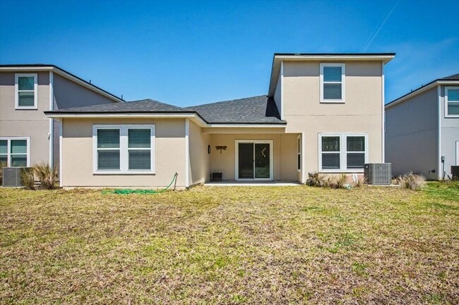 Building Photo - Beautiful Open Layout 4 Bed, 3 Full Bath | A True Masterpiece Backing to a Peaceful Pond with Mod...