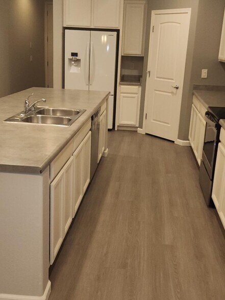 Kitchen and pantry door - 40768 W Rio Grande Dr