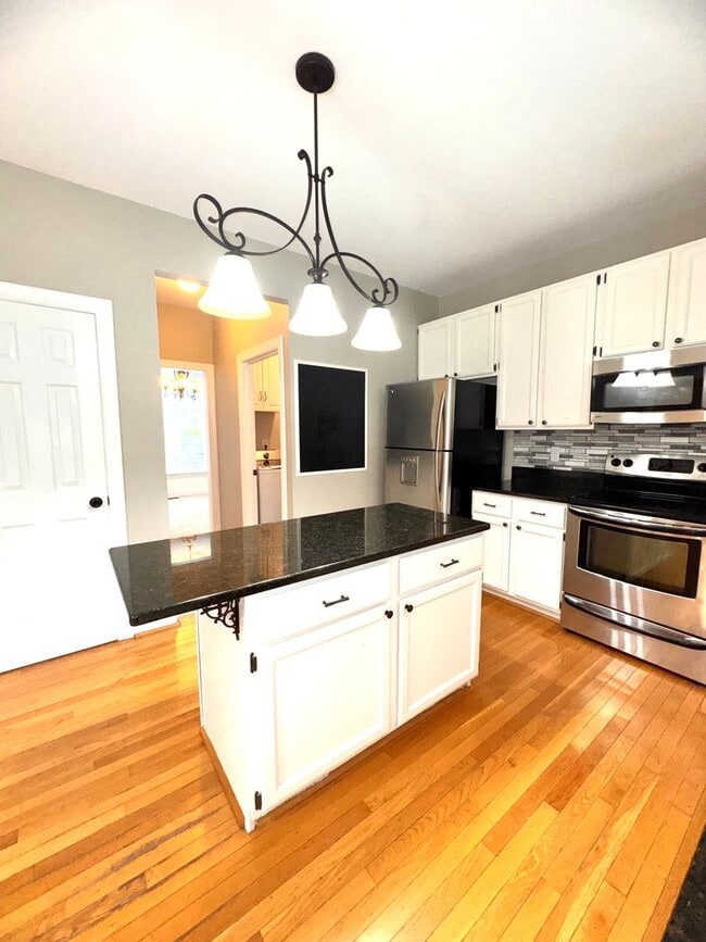 Building Photo - Spacious 4BR 2.5BA Home in Adams Farm with...