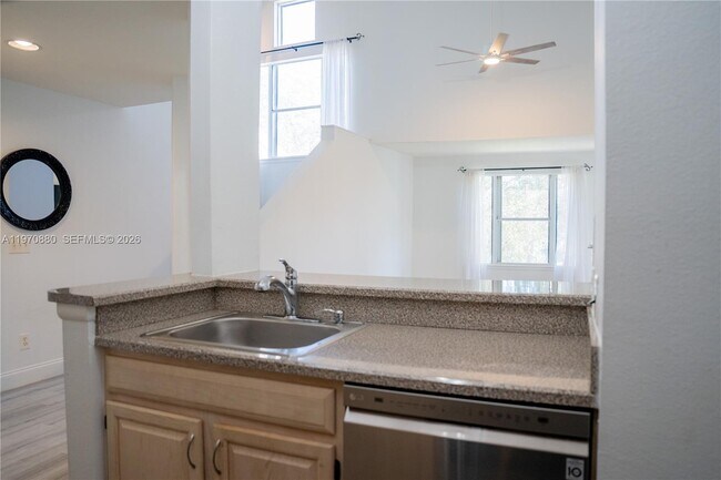 Building Photo - 1865 Palm Cove Blvd