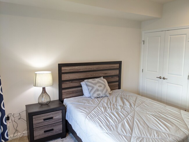 Building Photo - Bottom level (two story) *END UNIT* condo ...