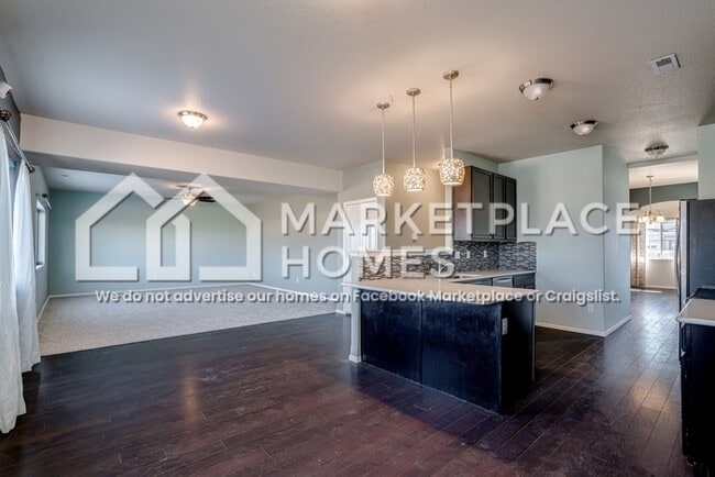 Building Photo - 9799 Desert Lily Cir