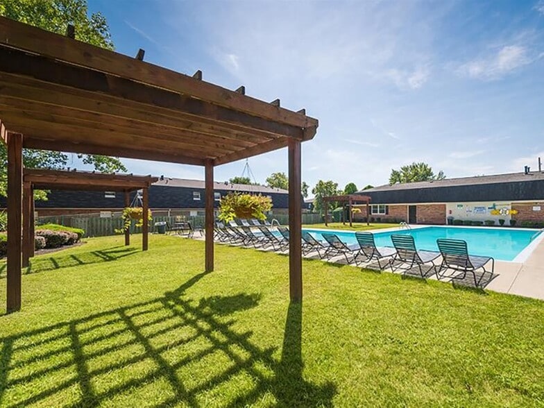 Relax Poolside Underneath the Shade Arbors - Bayberry Place Townhomes