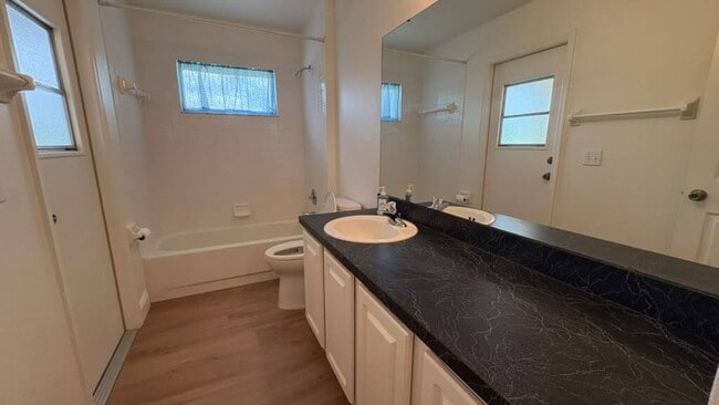 Building Photo - "Stunning 4-Bedroom Lake View Home in Oviedo – Spacious 2,132 Sq Ft Retreat!"