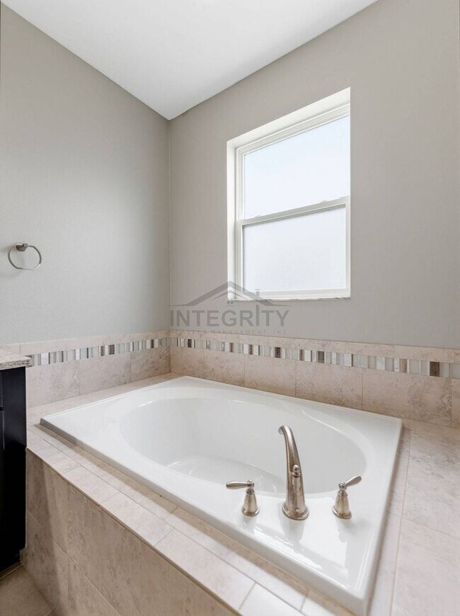 Building Photo - 8947 Garden Party Dr