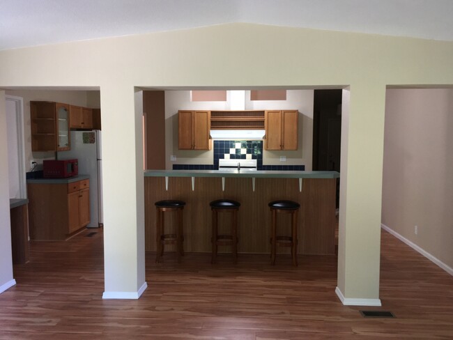 Open view of Kitchen from Living Room - 13210 Wagon Wheel