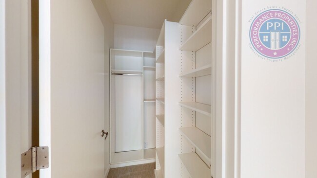 Building Photo - Riverfront Location, Luxury Townhome - End Corner Unit, Two En-Suites, Attached Garage