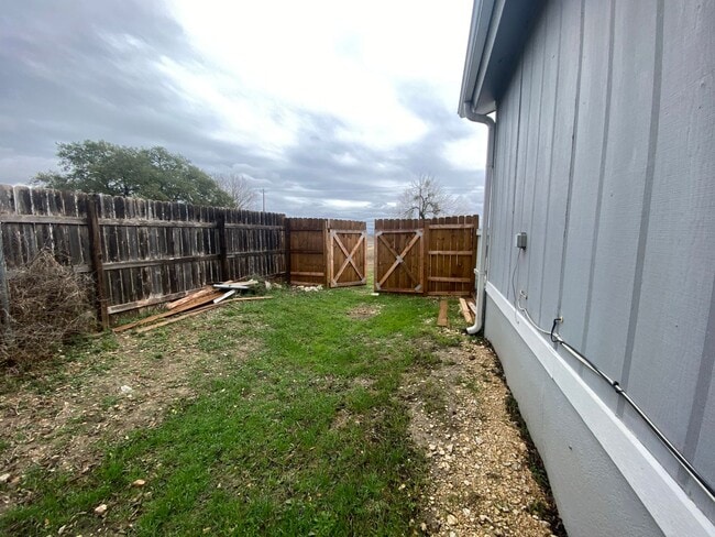 Building Photo - 1/1 Duplex / Fridge, Washer & Dryer Included  / Large Front Deck / Small Fenced in Side Yard/ NBISD