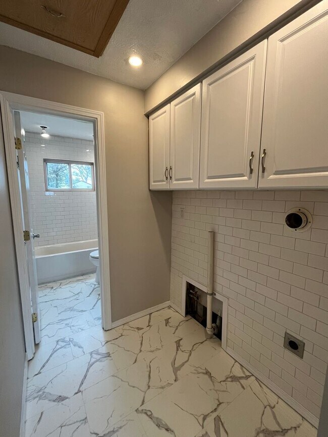 Building Photo - Spacious 3-Bedroom Ranch with 2-Car Garage & Oversized Fenced Backyard